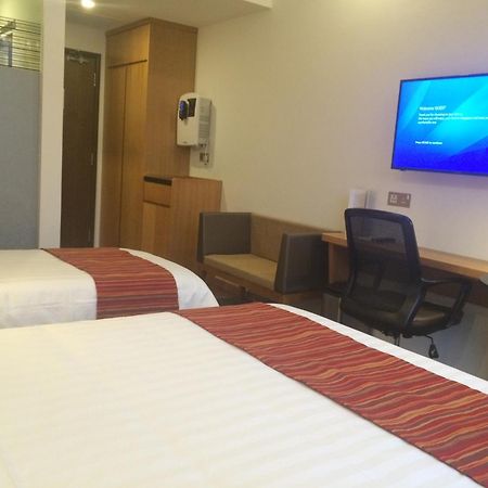 Hotel Grand Central Сінгапур Номер фото